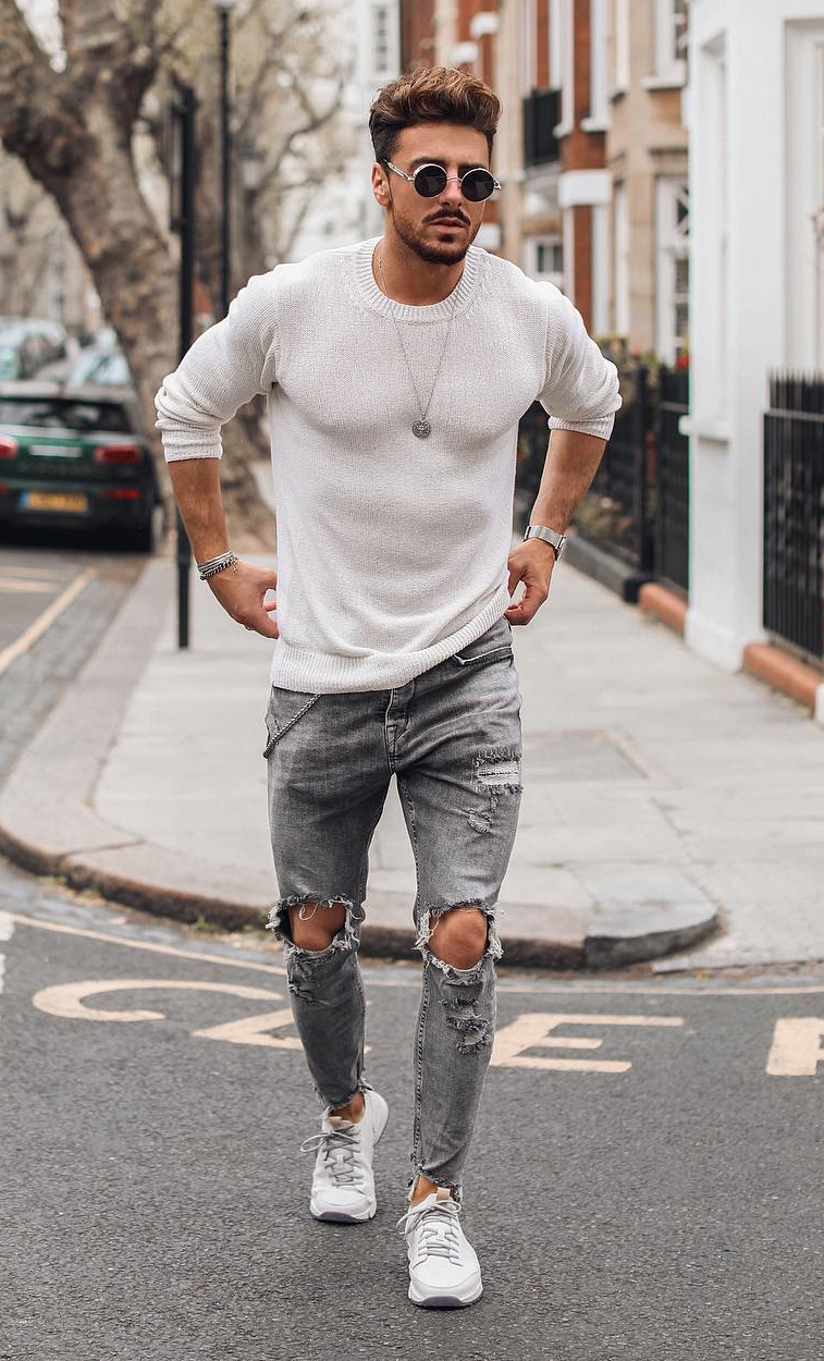 Men's outfit combination of gray sweater and ripped jeans